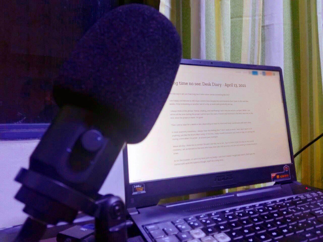 Maono desktop microphone beside my current workspace. 